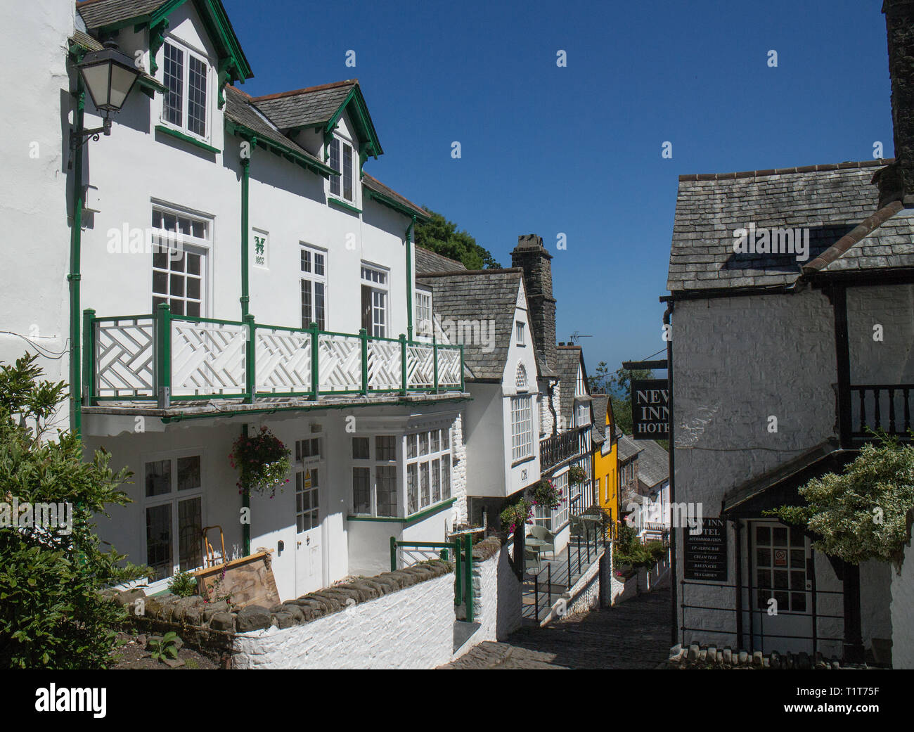 Houses in the steep cobbled high street of Clovelly village, North Devon Stock Photo