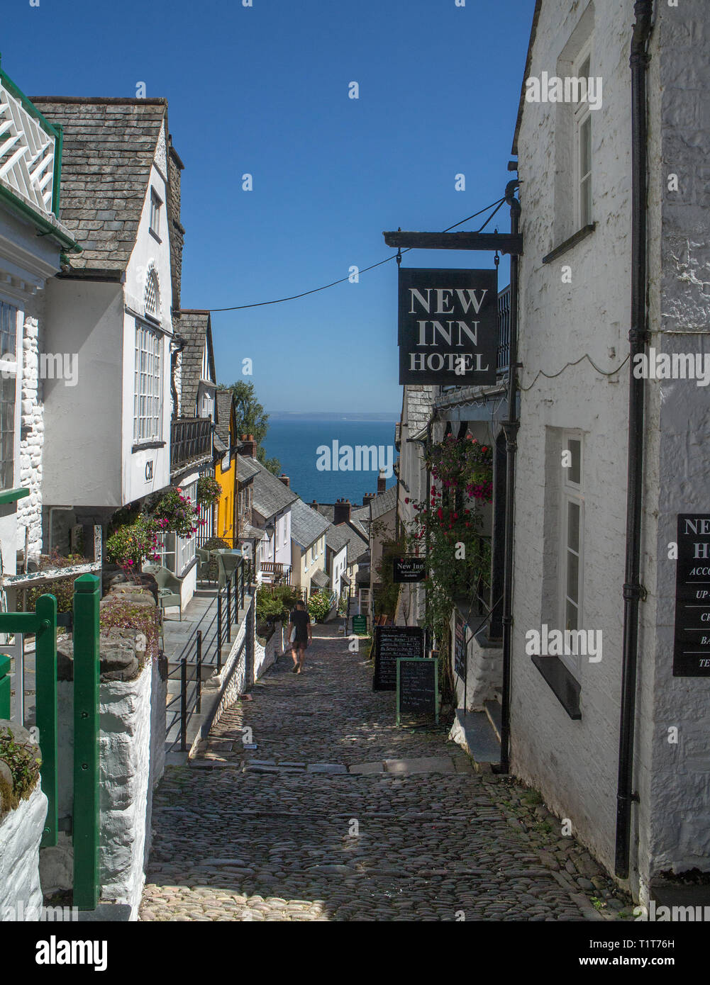 The steep cobbled high street of Clovelly village, North Devon Stock Photo