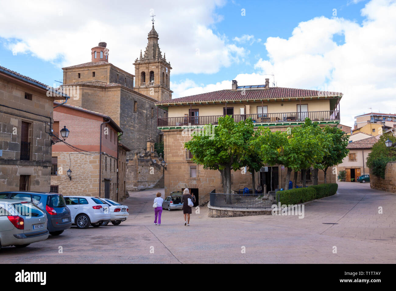 Neighbors and tourists strolling through the streests of Briñas in La Rioja, Spain - Stock Image