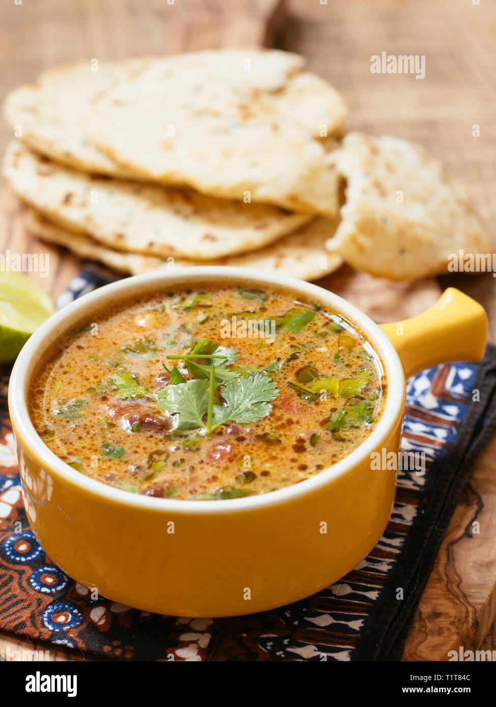 Curried Mung Bean Soup with Naan Breads Stock Photo