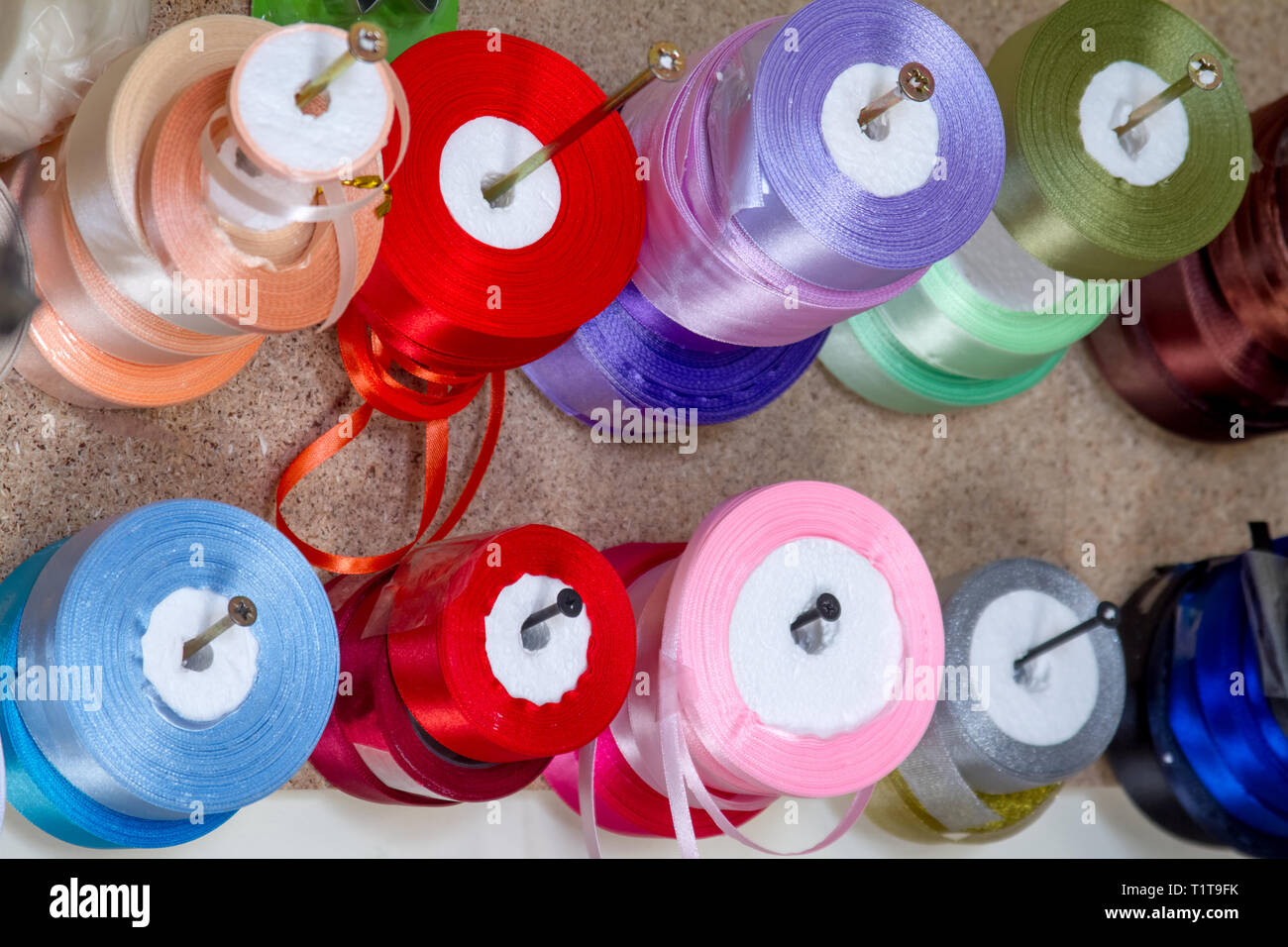 haberdashery haberdasher ribbon reels rolls rows and trims in fabric retail shop sew sewing