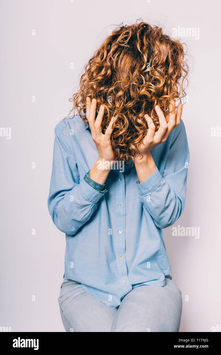 Unrecognizable Young Woman Wearing Blue Shirt Applying With Hands