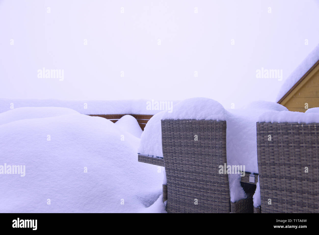 Snow covered deck with furnitures in Norway Stock Photo Alamy