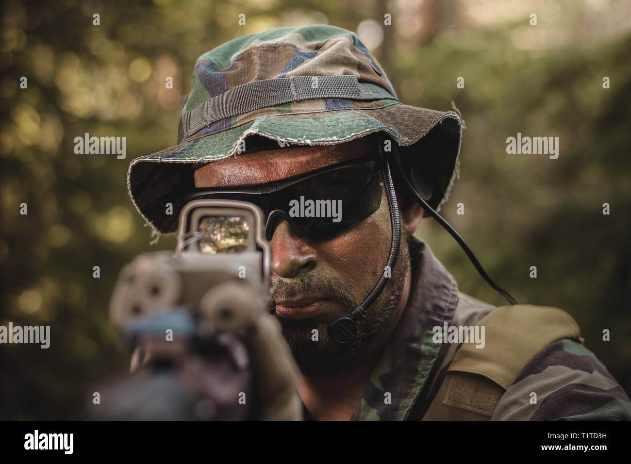 Special Forces soldier with an assault rifle in the forest Stock Photo ...