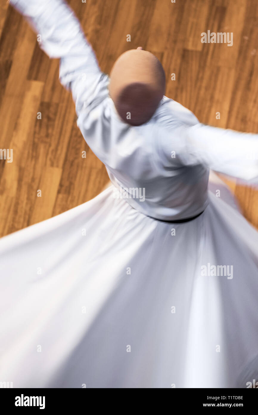 Unidentified whirling Dervishes or Semazen in Konya Stock Photo