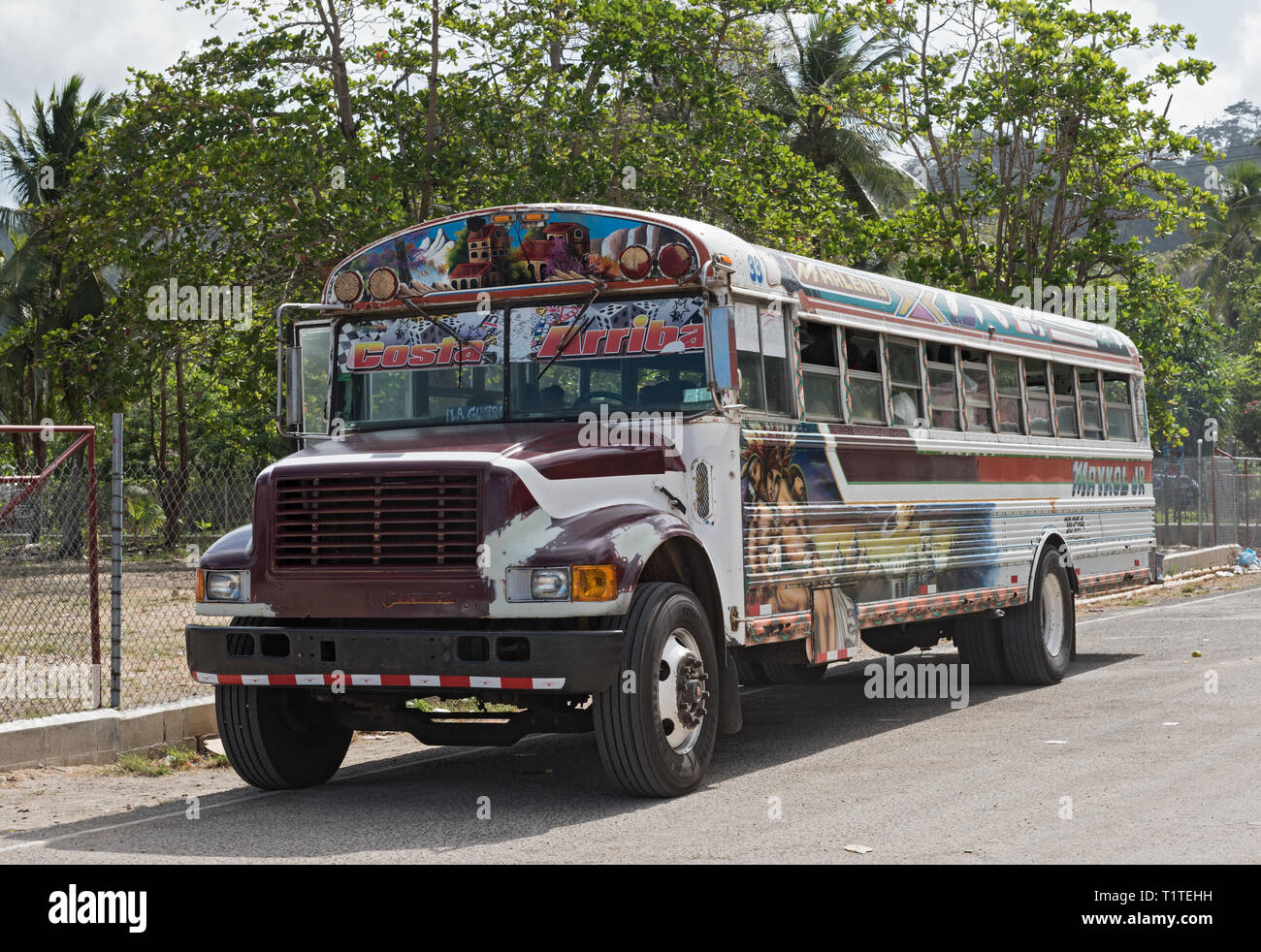 colorful painted chicken bus in puerto lindo, panama Stock Photo