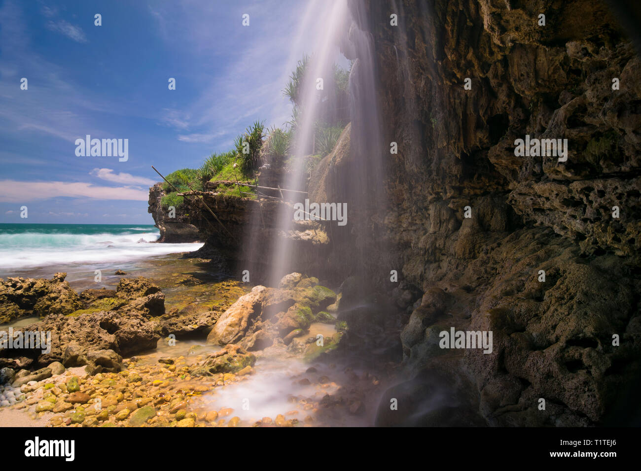 Jogan waterfall in special region of Yogyakarta end up in the sea Stock Photo