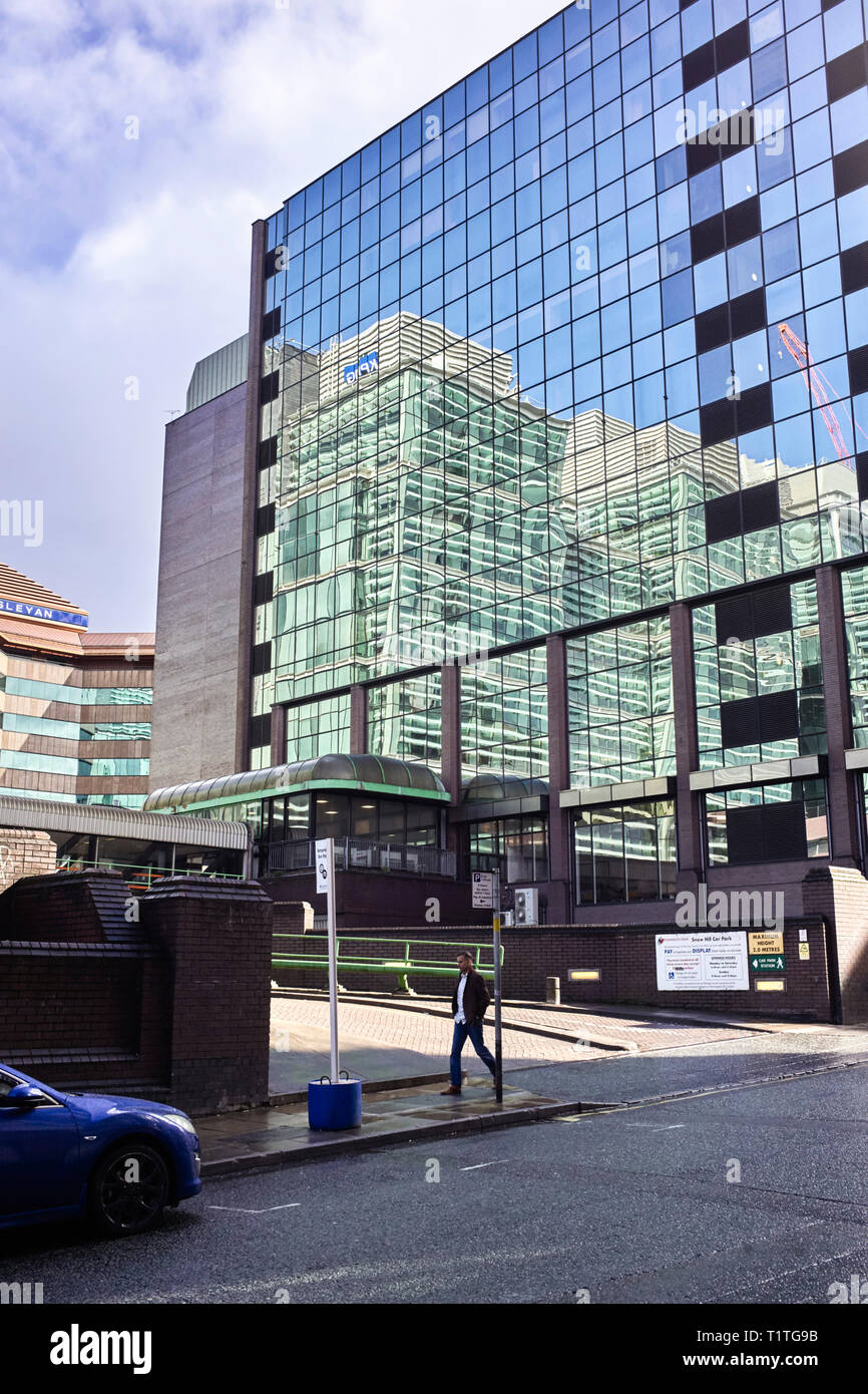 Reflective building at Snow Hill with KPMG logo showing on Livery Street in the centre of Birmingham Stock Photo