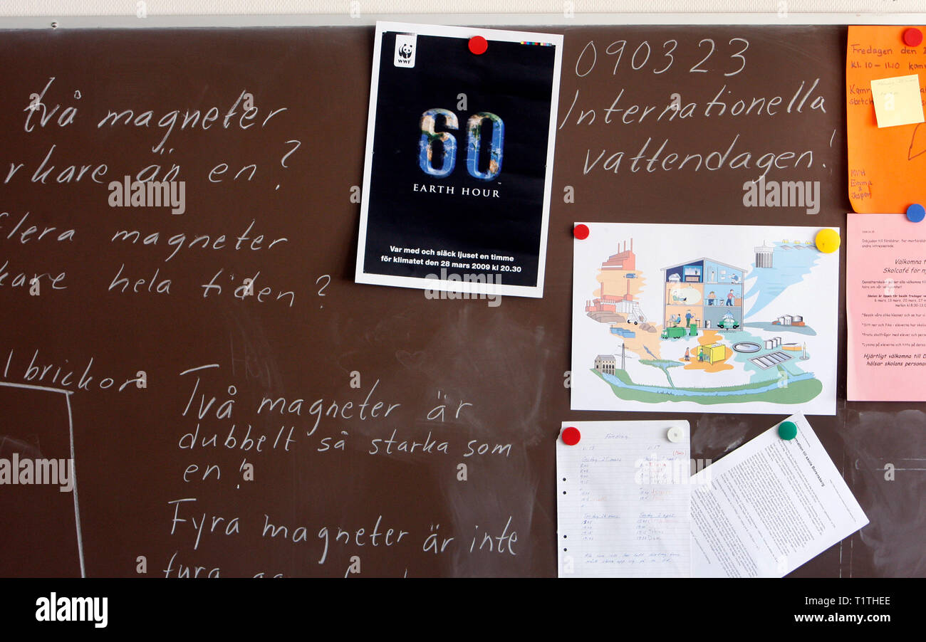 A poster on a blackboard, in a classroom, about Earth hour. Stock Photo