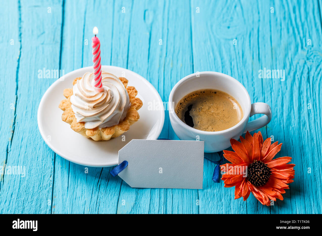 Flower, empty postcard, coffee, cake Stock Photo