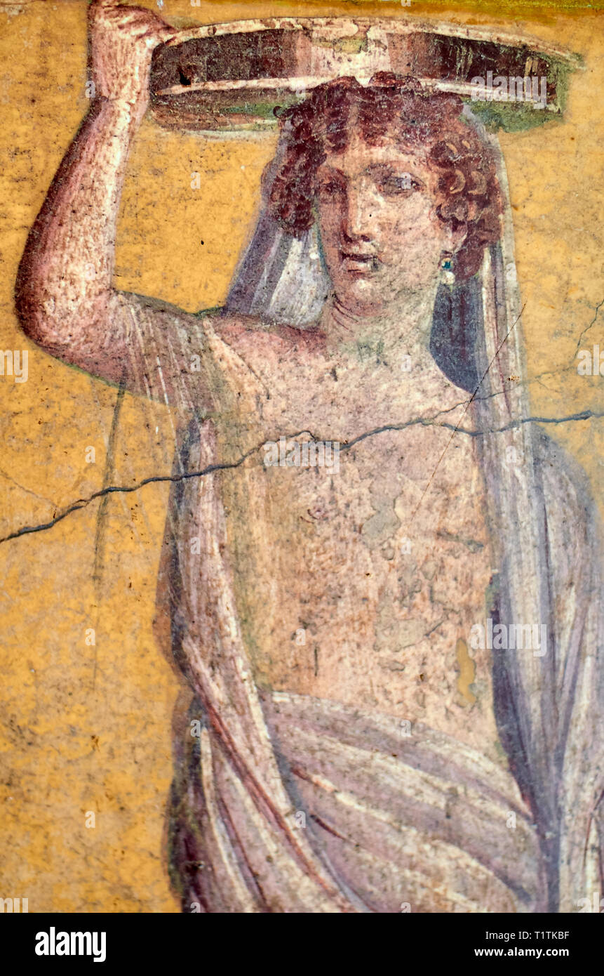 Figure of a woman painted in a Fresco in a Domus of Pompeii Stock Photo