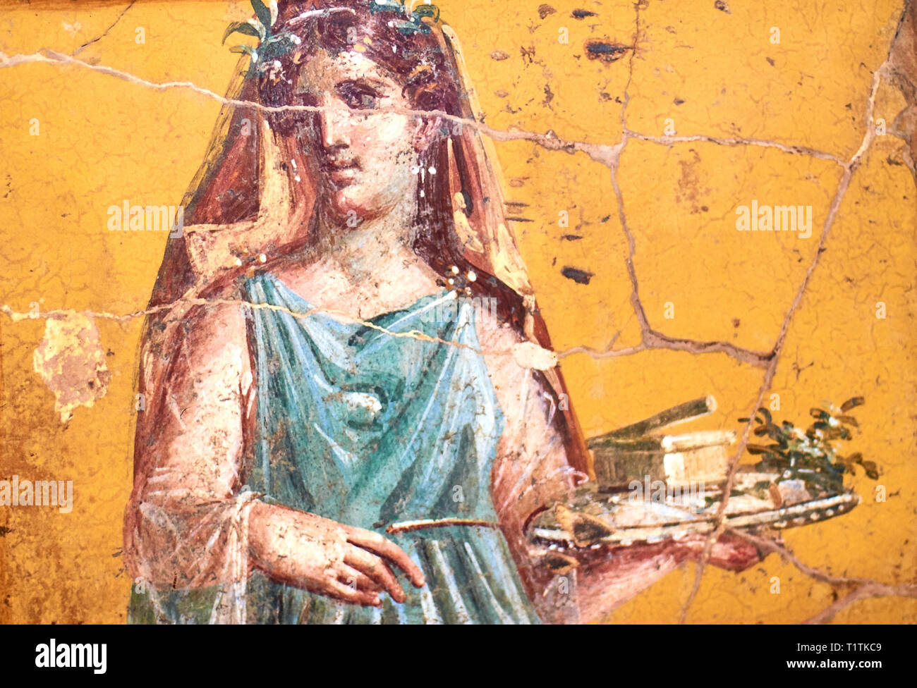 Figure of a woman painted in a Fresco in a Domus of Pompeii Stock Photo