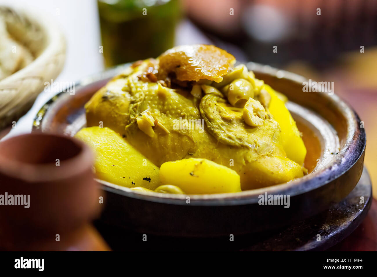 Chicken lemon tagine, with green olives, preserved lemons and potatoes
