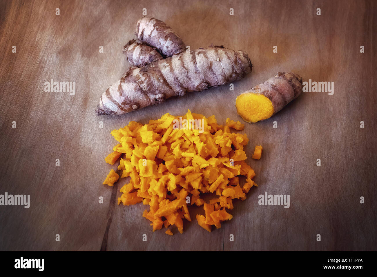 Turmeric, tuber, intact and broken root. Single ingredient isolated on