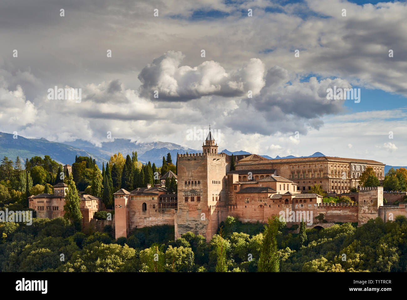 SPAIN ANDALUSIA GRANADA THE ALHAMBRA STORMY SKY AND LARGE CLOUDS OVER THE SIERRA NEVADA MOUNTAINS Stock Photo