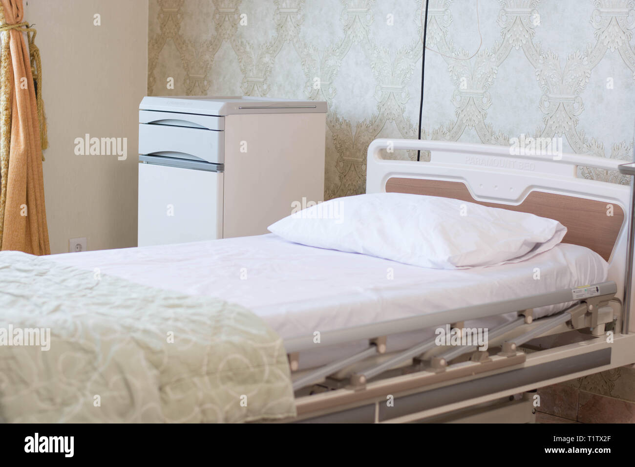 hospital indoors interiors with bed and pillow photographed at day time