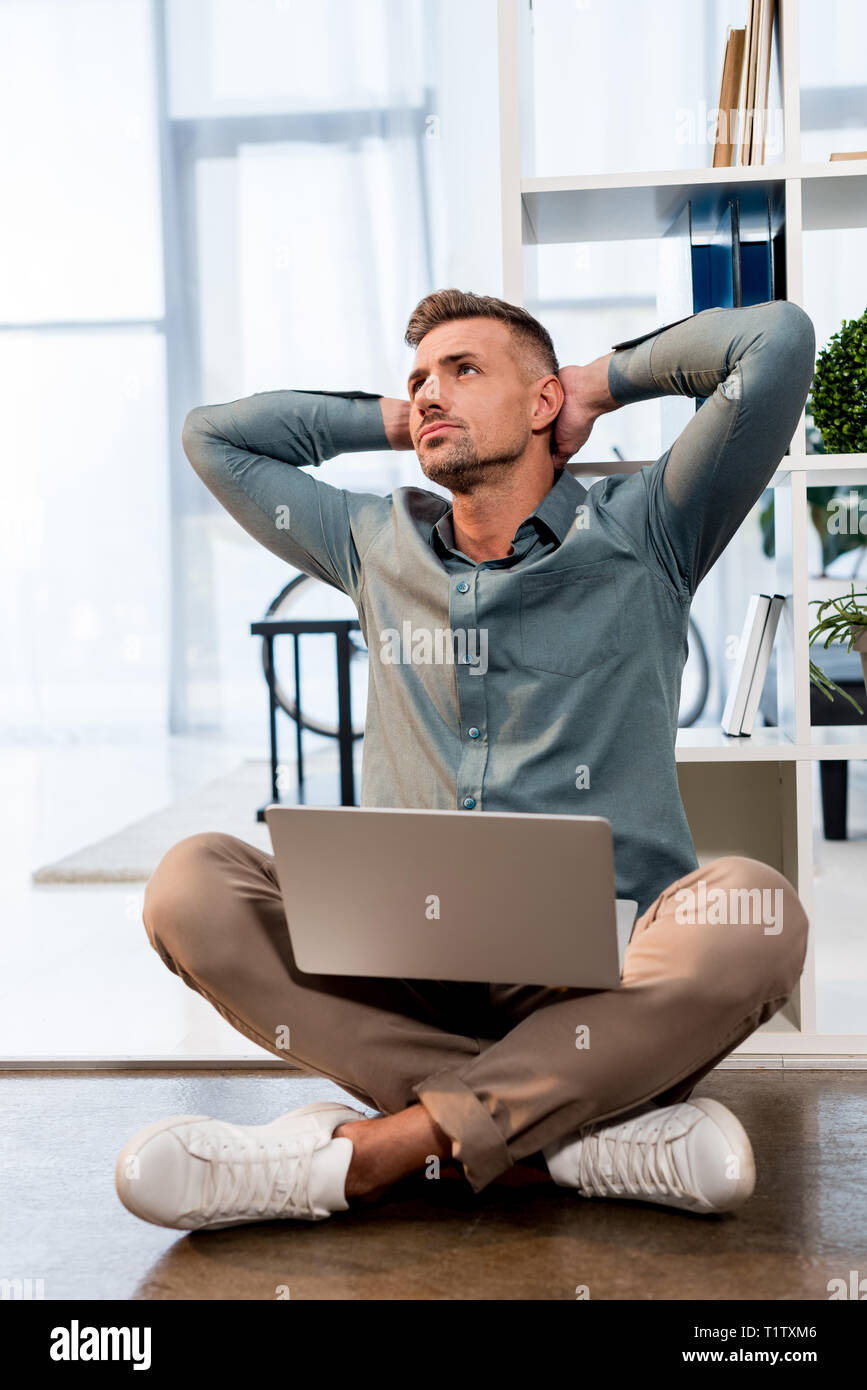 Businessman legs crossed on floor hi-res stock photography and images ...