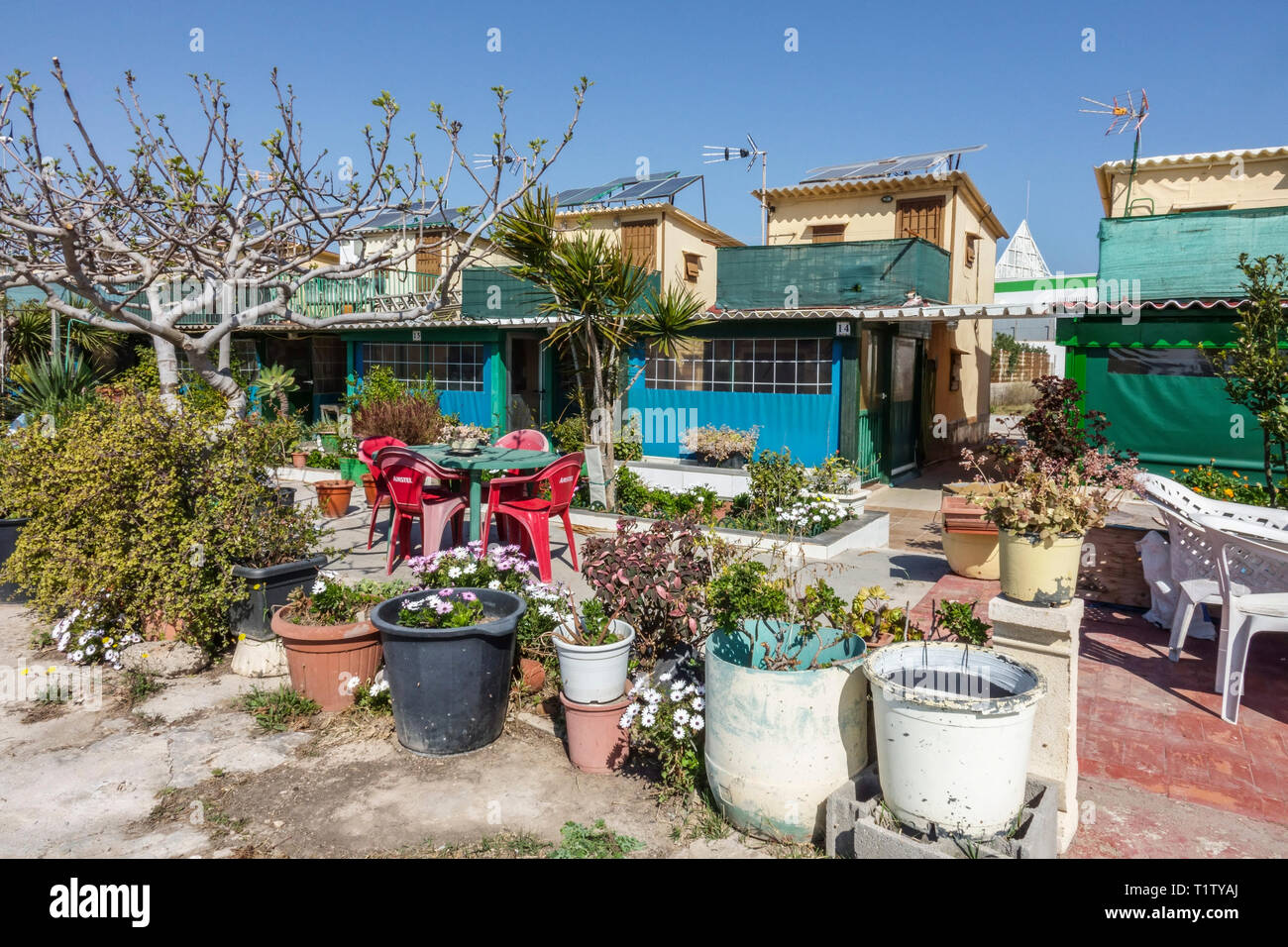 Small houses of fishermen is a group of 31 houses permanently inhabited all year round, is wonderful architecture, Alboraya, Valencia Spain Stock Photo