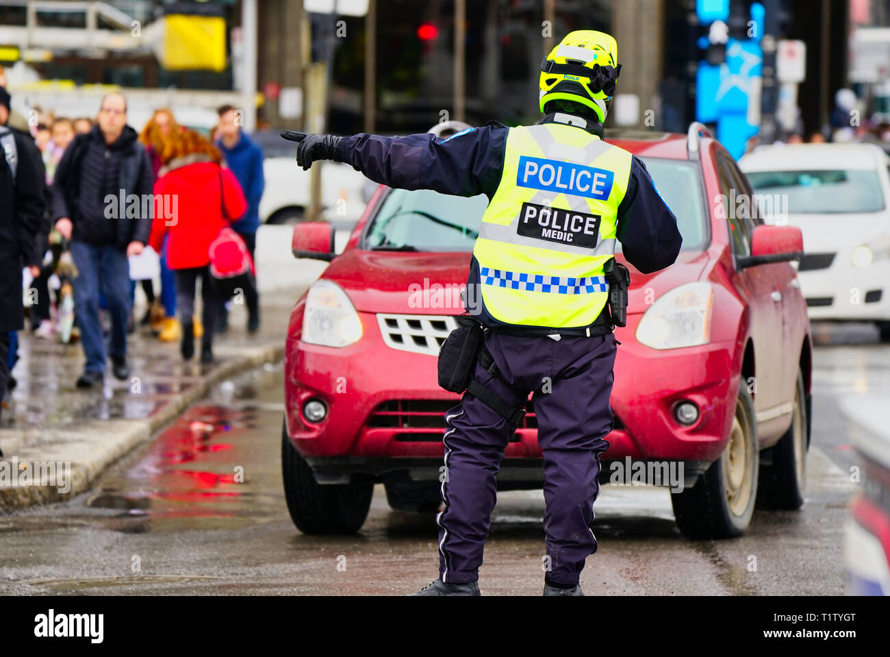 Montreal, Canada,March,15, 2019.Police officer directing downtown traffic Credit:Mario Beauregard/Alamy Live News Stock Photo