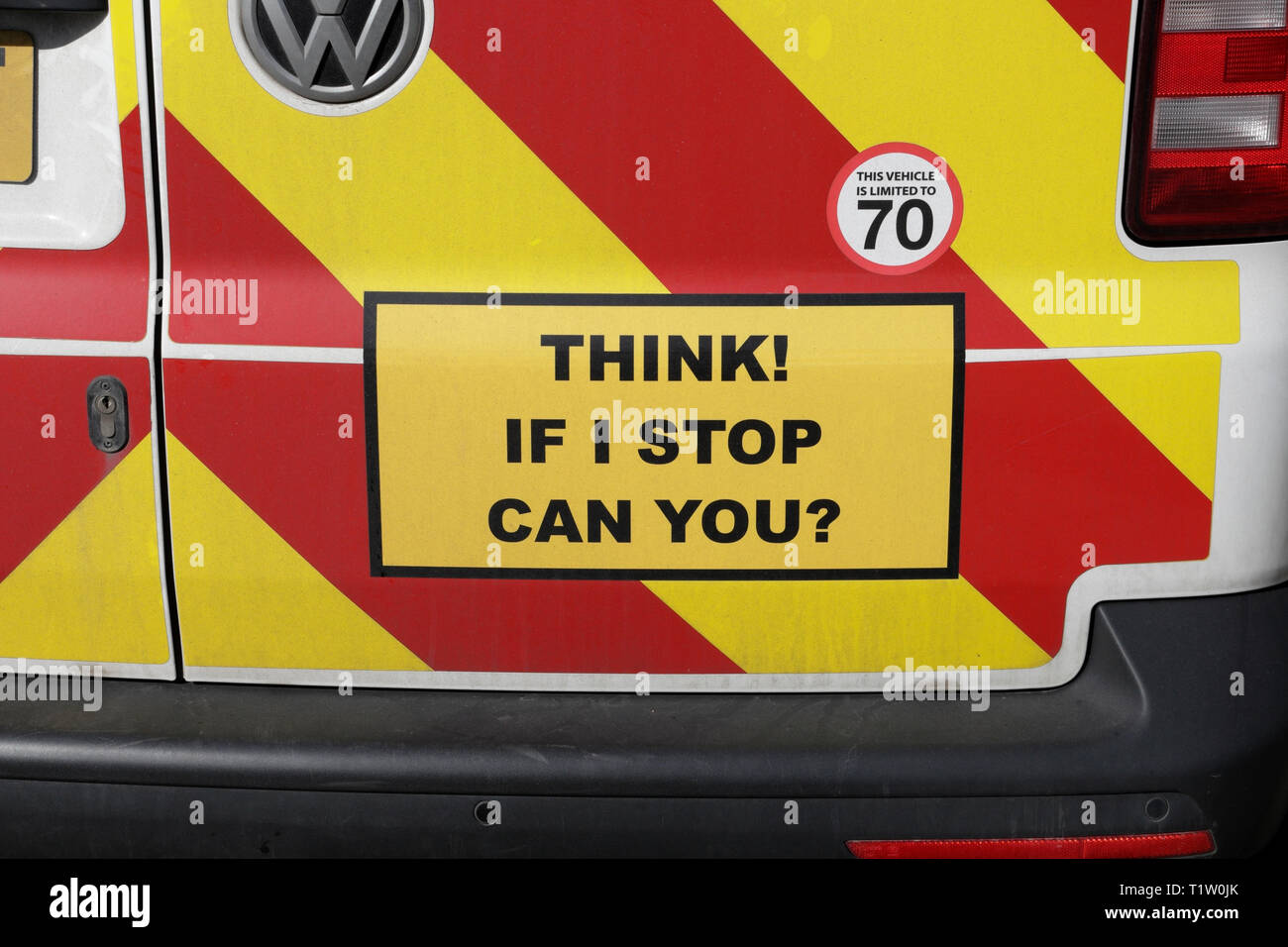 Road safety sign on rear of van, Think if I stop can you ? warning sign on rear of vehicle UK Stock Photo