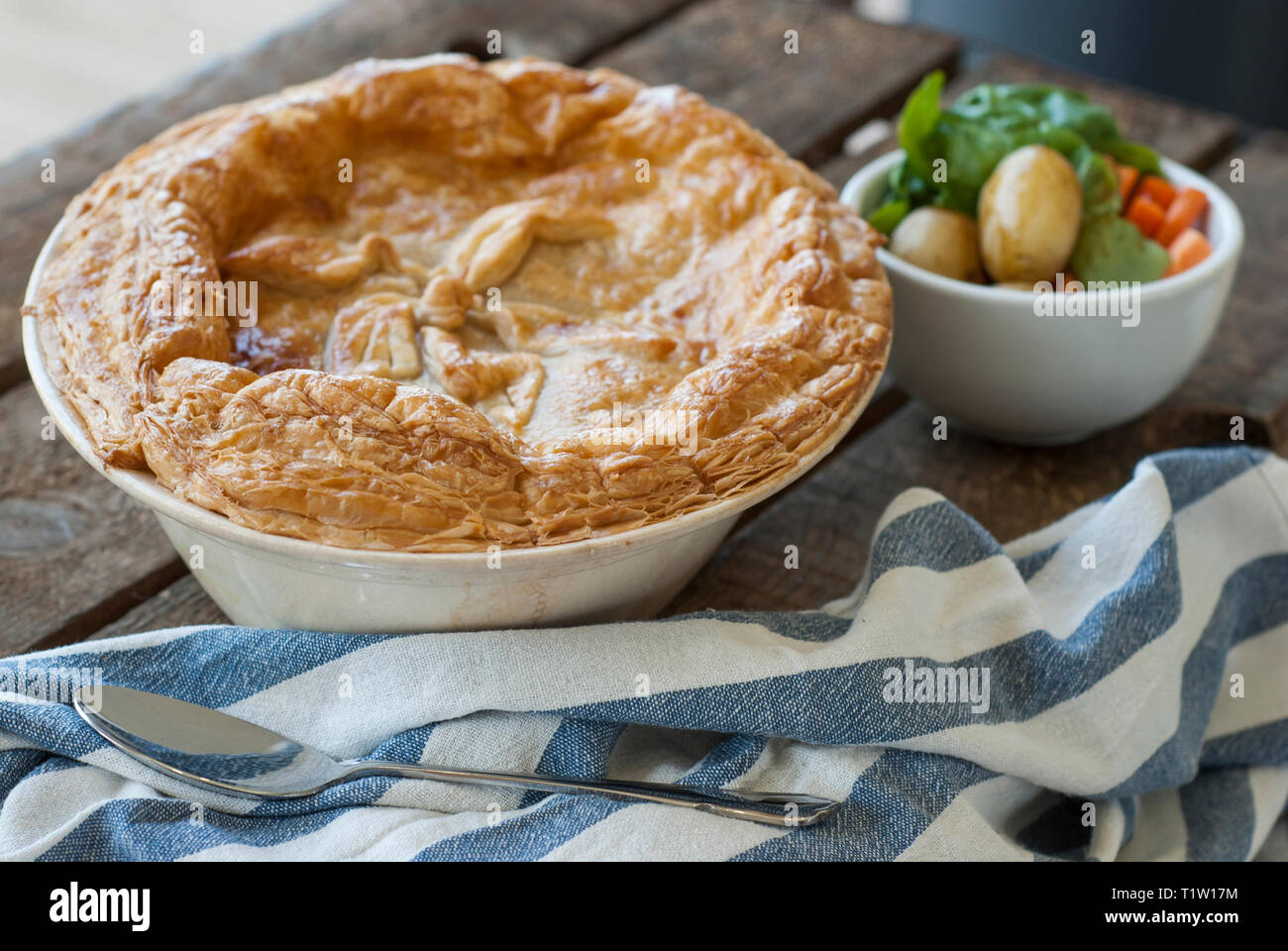 Chicken pie with side vegetables Stock Photo Alamy