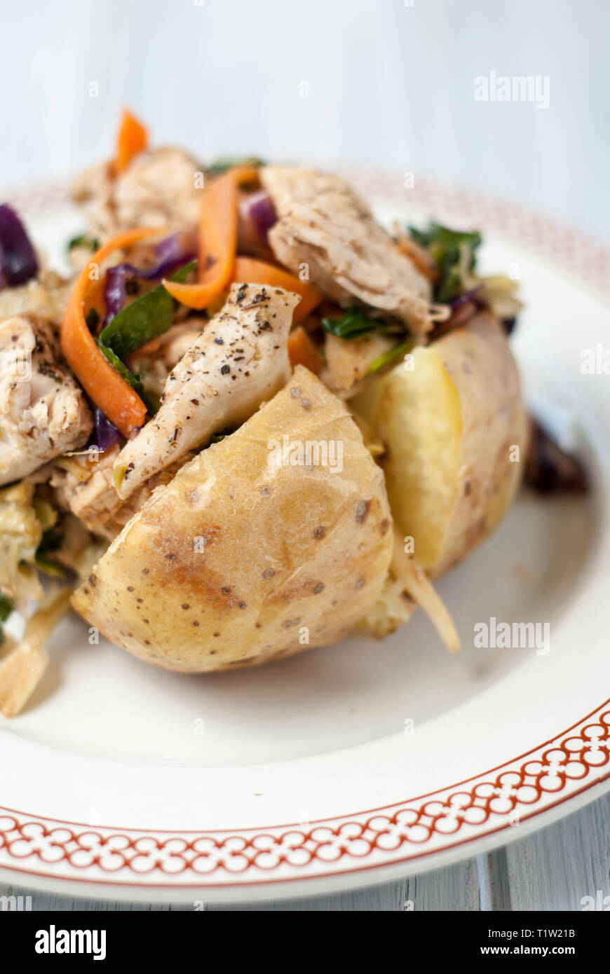 Oriental chicken jacket potato recipe Stock Photo Alamy