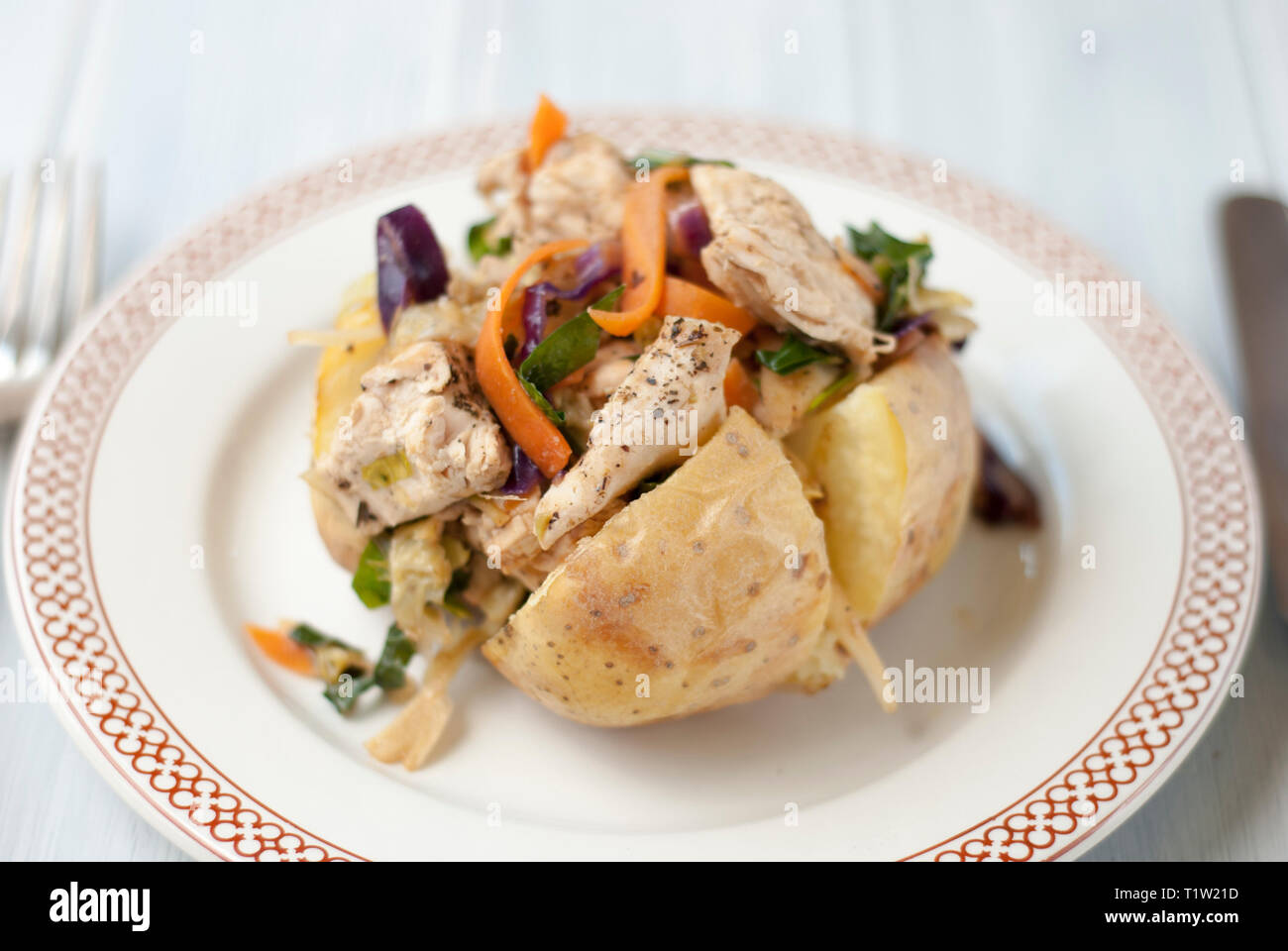 Oriental chicken jacket potato recipe Stock Photo Alamy