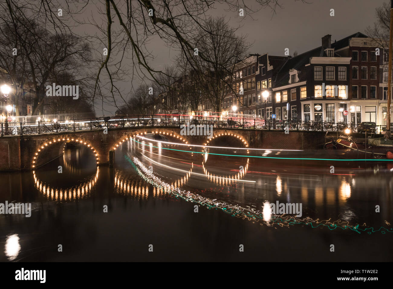 Amsterdam Night Bridge Lights Stock Photo