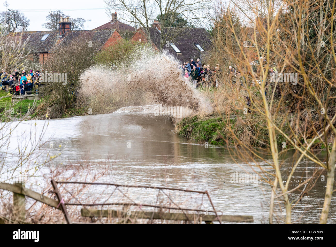 A 5 star Severn Bore on 22/3/2019 breaking against the bank and soaking onlookers at Minsterworth, Gloucestershire UK Stock Photo