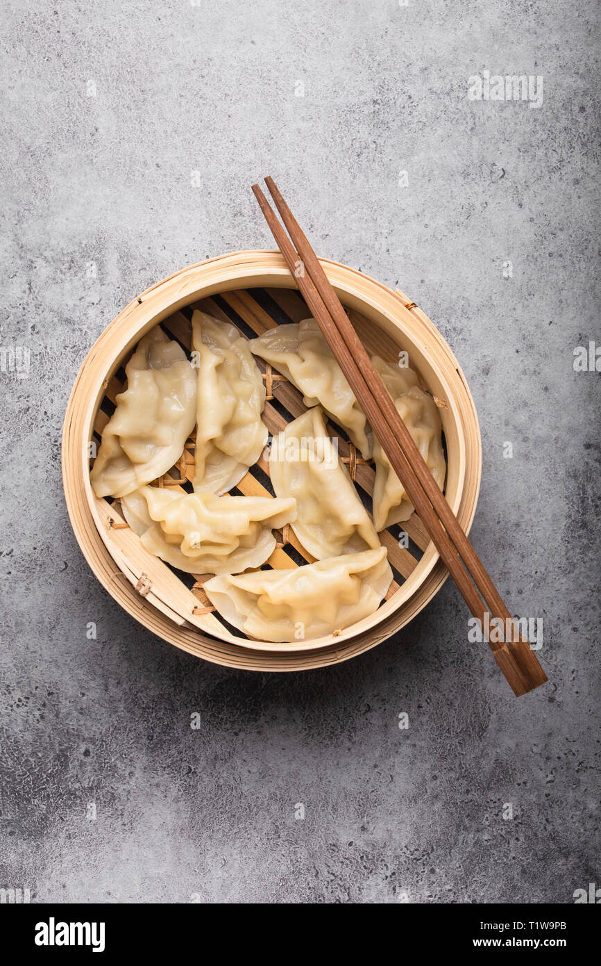 Asian dumplings in bamboo steamer Stock Photo Alamy