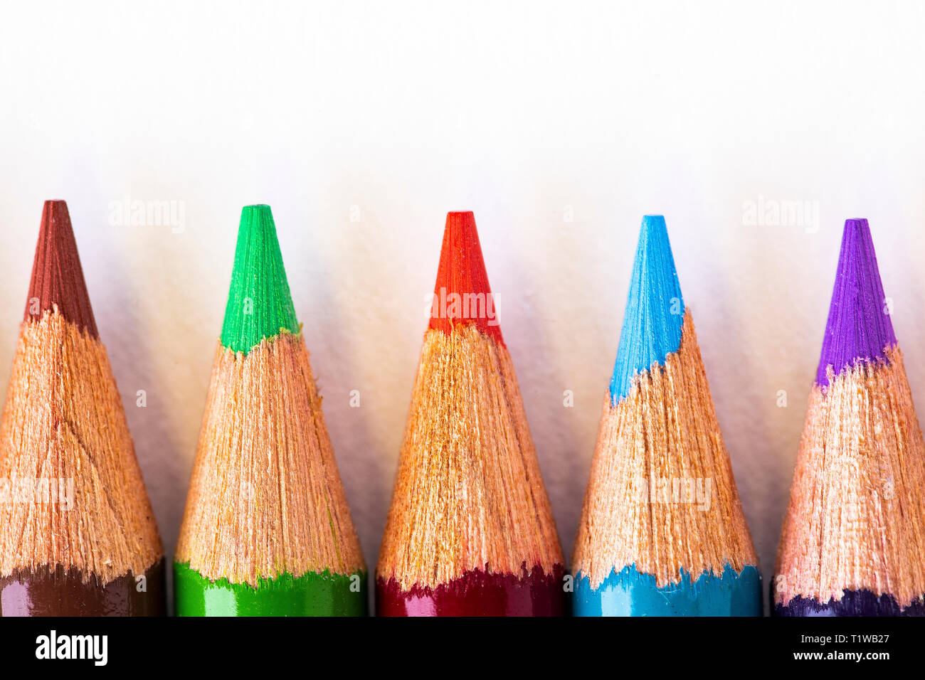 Closeup view of five sharpened color pencils. Stock Photo