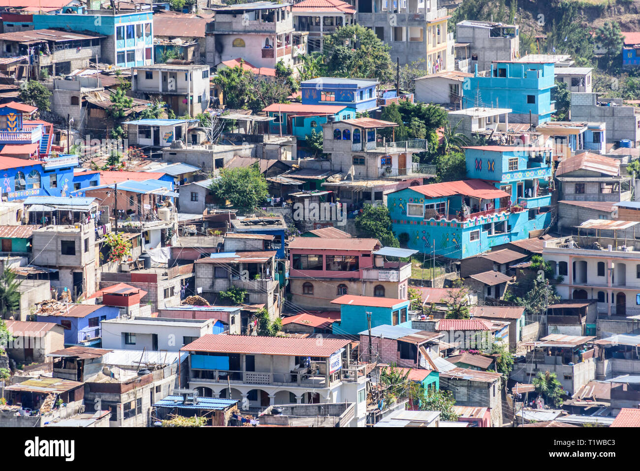 Santa Catarina Palopo, Lake Atitlan, Guatemala - December 29, 2018: Painting project in lakeside town paints houses with traditional clothing designs. Stock Photo