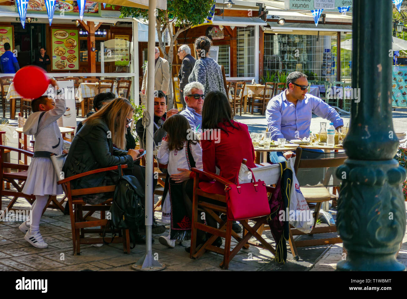 Families enjoying sunshine in Ancient Corinth on Greek Independence Day, March 25th Stock Photo