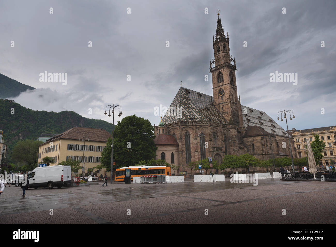 The Cathedral of Bolzano, South Tyrol, Italy, a late-Gothic church with a  patterned, multicolor marble roof and an elaborate bell tower Stock Photo -  Alamy
