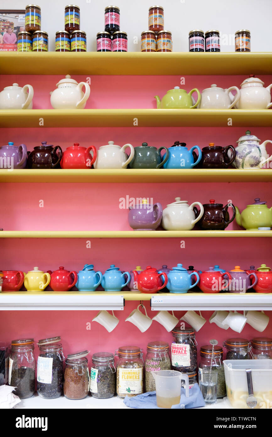 Tea pots on a shelf in the Wiveton Hall Fruit Farm cafe in North Norfolk, England. Stock Photo