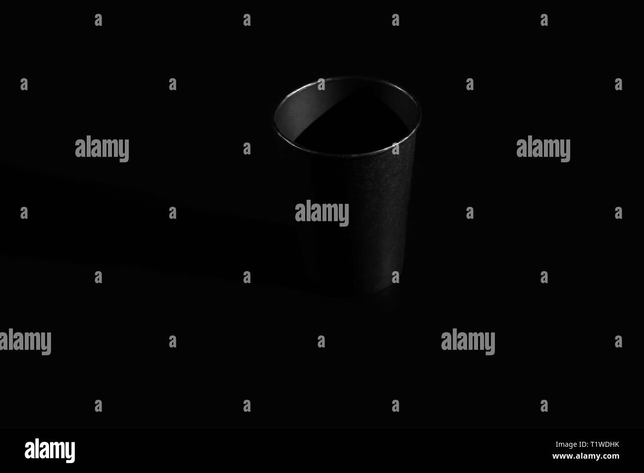 black paper glass isolated on black background Stock Photo Alamy