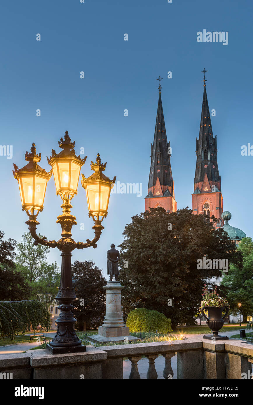 Old lamp post and the Cathedral and Gustavianum at night. View from the University park, Uppsala, Sweden, Scandinavia Stock Photo