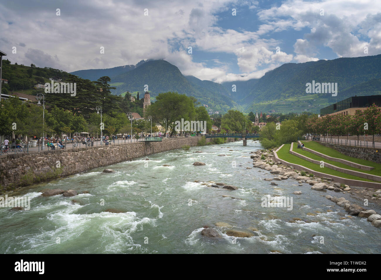 Merano in South Tyrol, a beautiful city of Trentino Alto Adige, View on the famous promenade along the Passirio river. Northern Italy Stock Photo