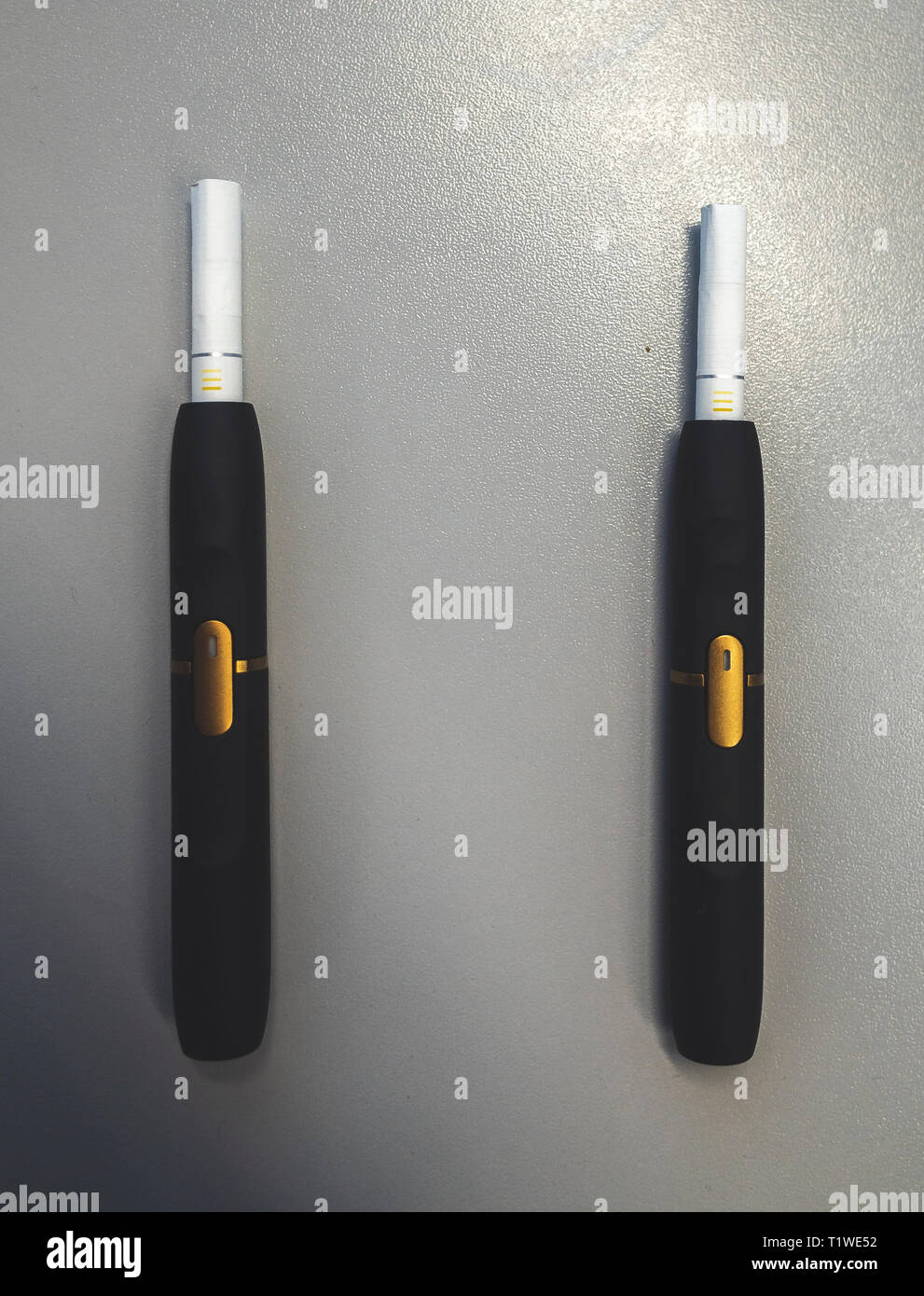 Download Tobacco Heating System And A Pack Of Tobacco Sticks On A Gray Background Stock Photo Alamy PSD Mockup Templates
