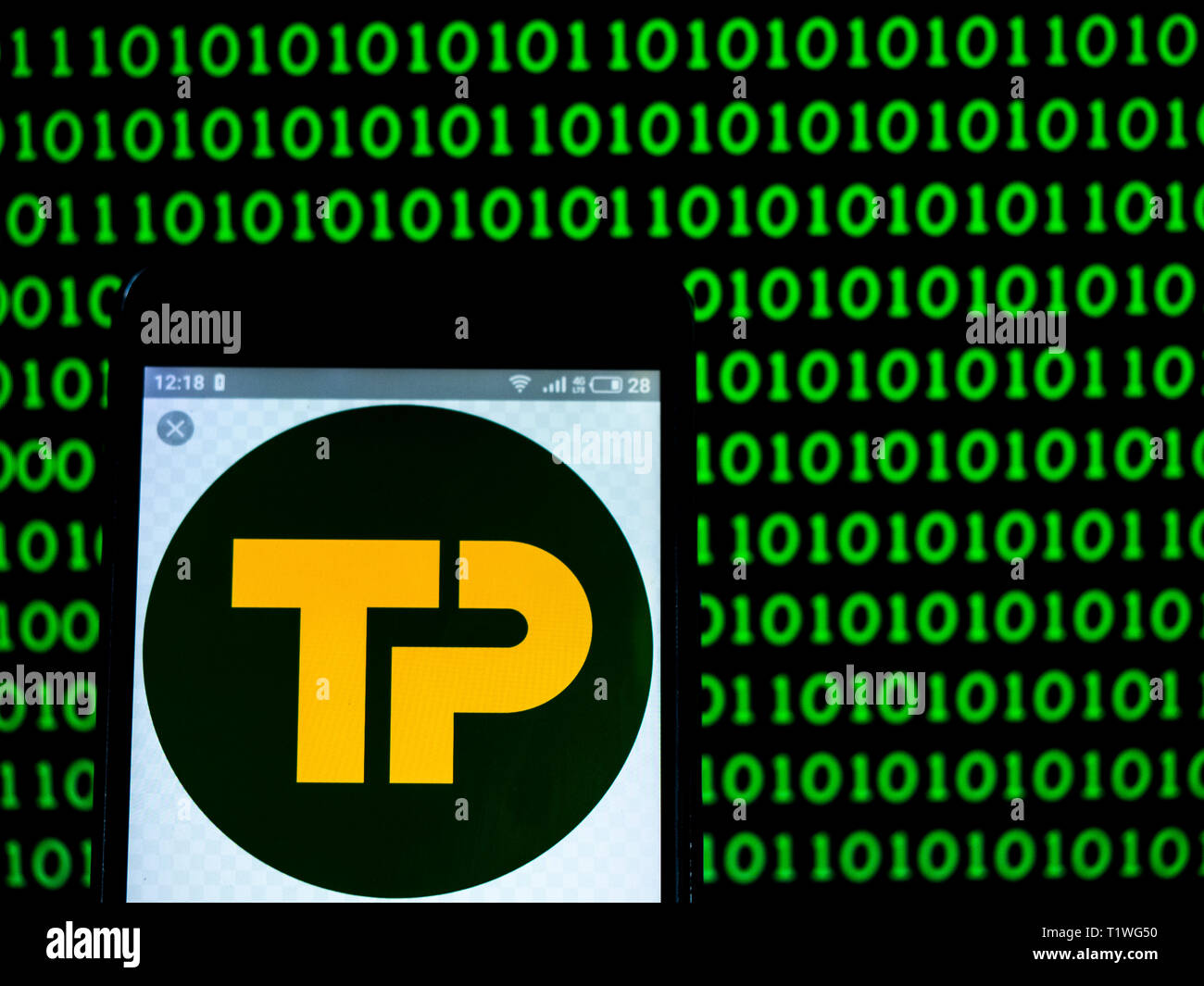 In this photo illustration a Travis Perkins plc logo seen displayed on a smart phone. Stock Photo