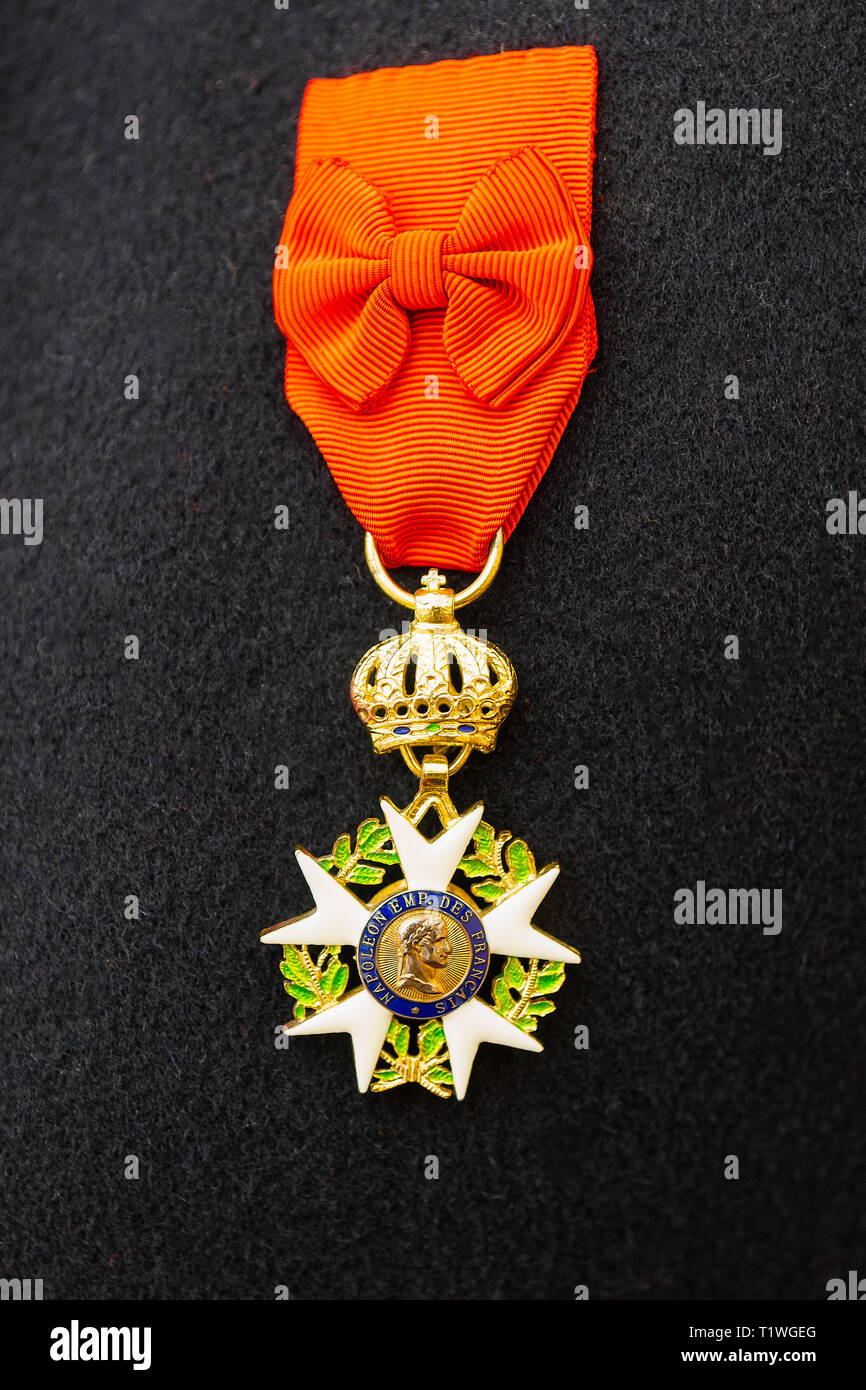 MOSCOW, AUGUST 22, 2018. Napoleon era Order of the Legion of Honor hangs on a red ribbon on a French army uniform during International Times and Epoch Stock Photo