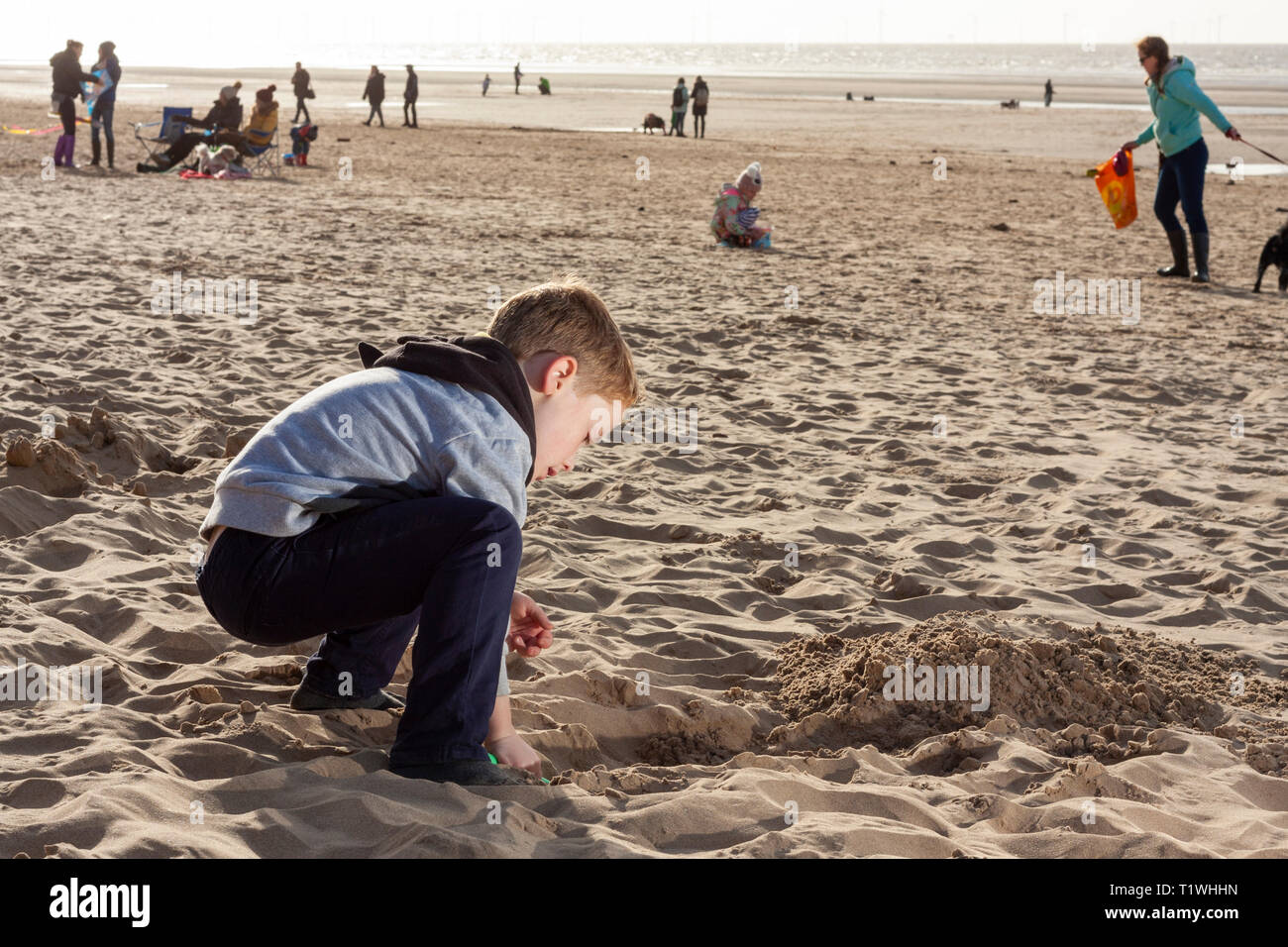 Digging a hole, boy hires stock photography and images Alamy