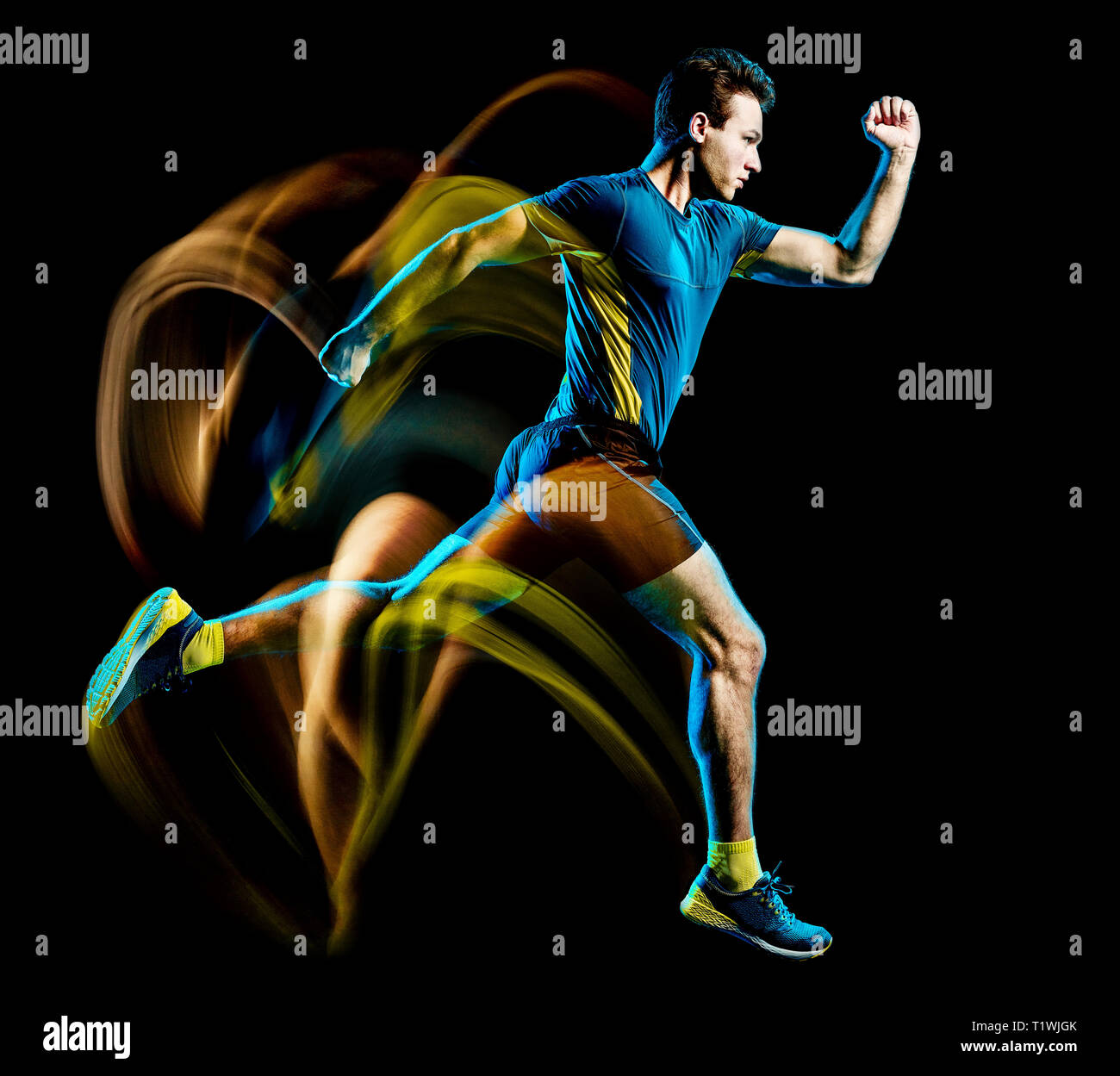 one caucasian runner running jogger jogging man light painting speed effect  isolated on black background Stock Photo