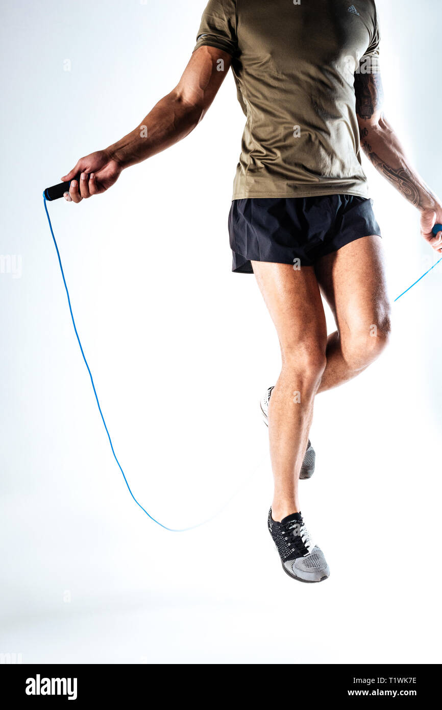 Man having a training with jump rope Stock Photo Alamy