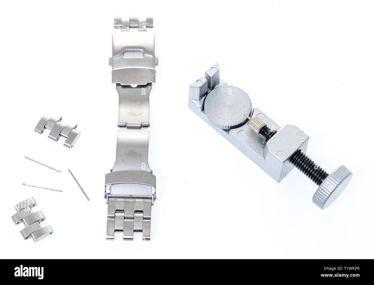 A watch pin watch band with a watch link remover tool on an isolated background Stock Photo Alamy