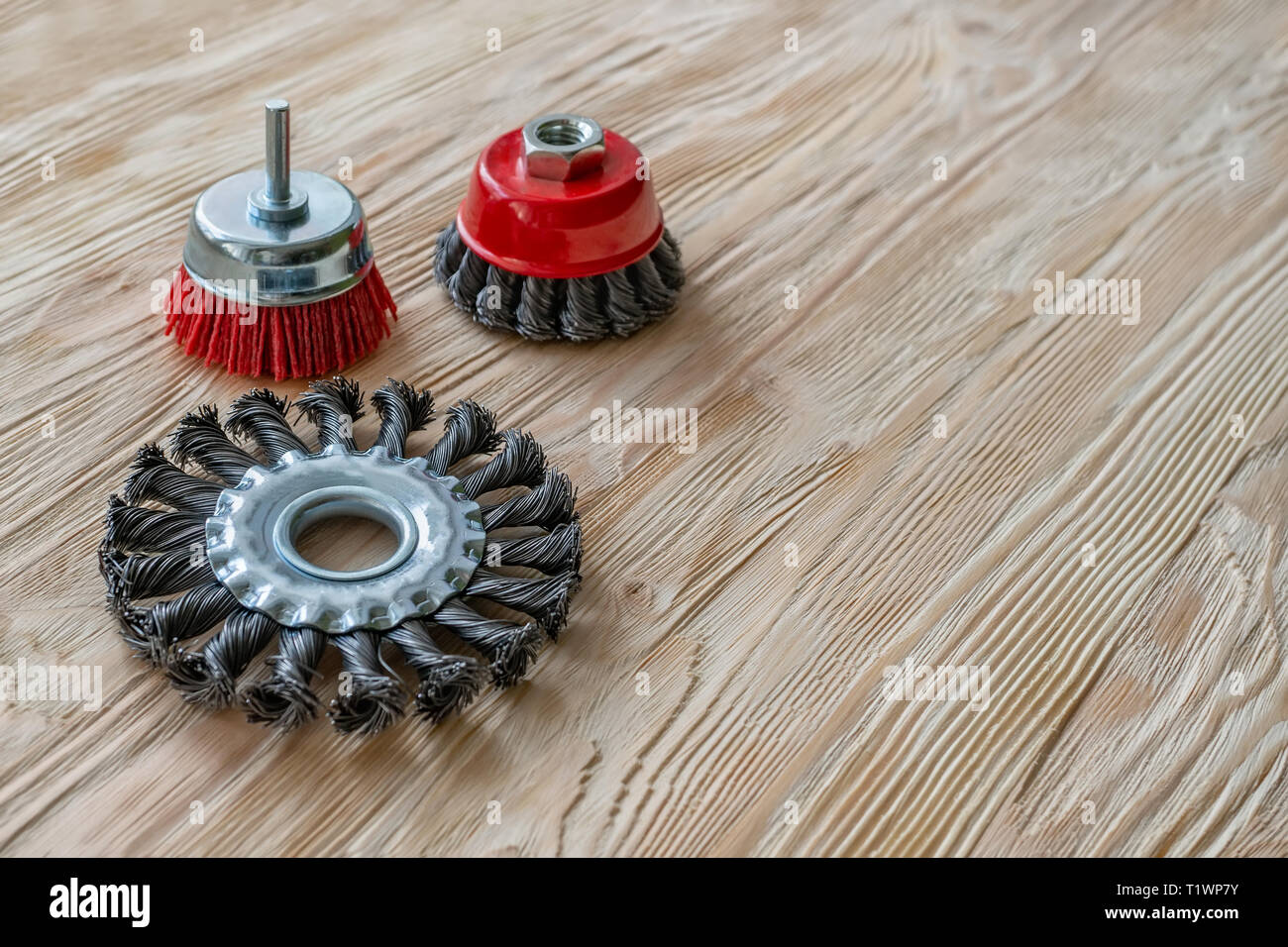 abrasive tools for brushing wood and giving it texture. Wire brushes on