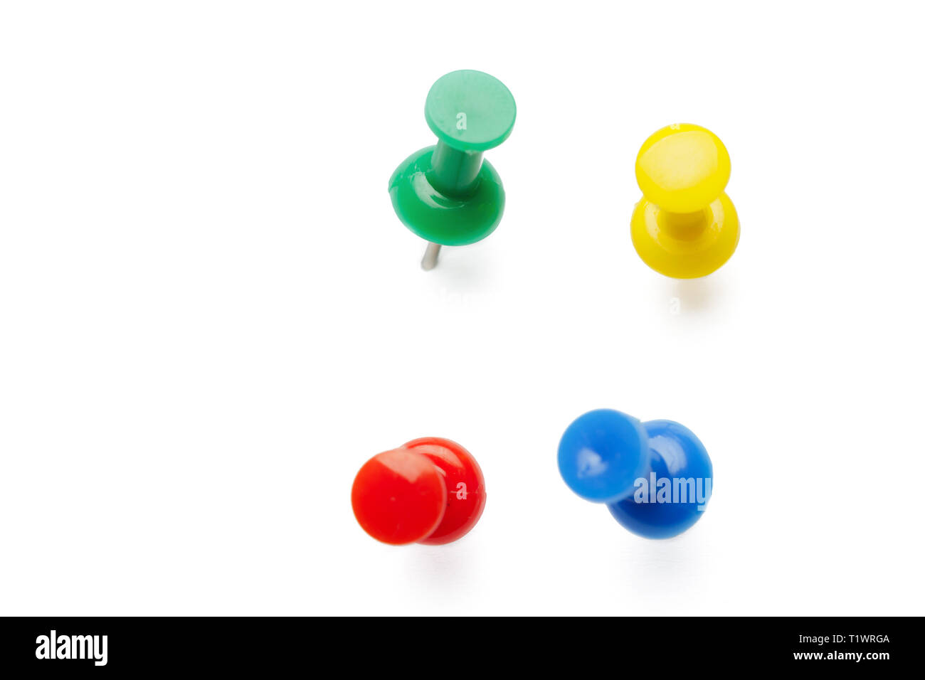 Push pins isolated on white background Stock Photo - Alamy