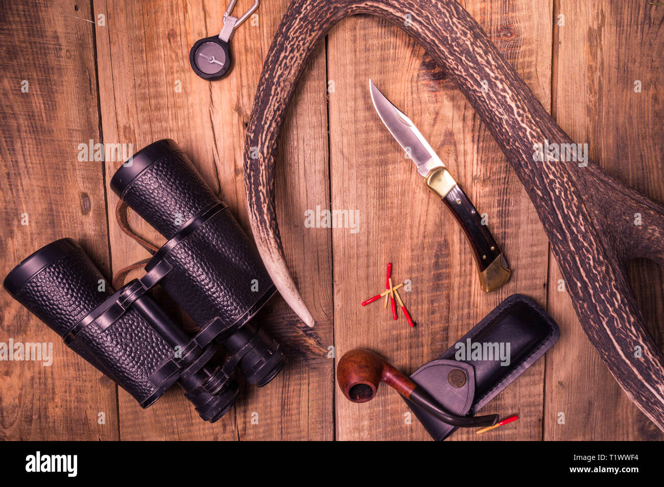 Things hunter. Knife and binoculars hunter. Binoculars and compass ...