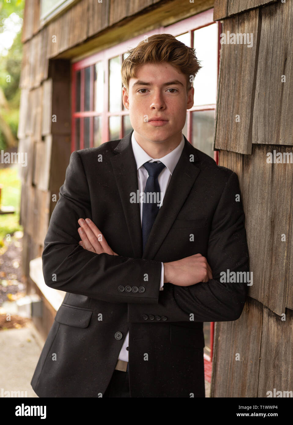 Teenage boy outside in suit Stock Photo - Alamy