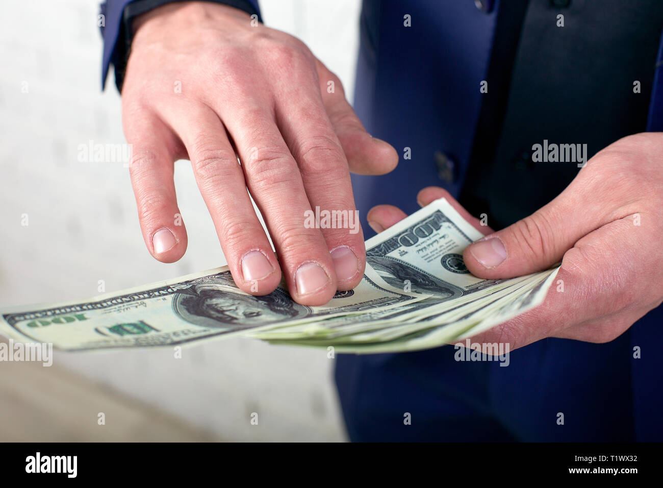 Young business throwing money concept hires stock photography and